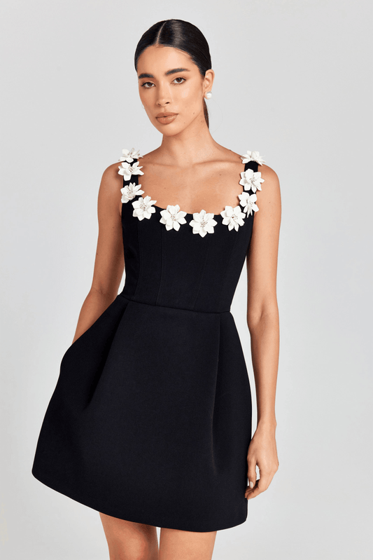 Fieno Daisy Elegance Black Mini Dress styled with white heels, perfect for elegant evenings and cocktails—Mini Dresses, Chic Black Dresses by Fieno